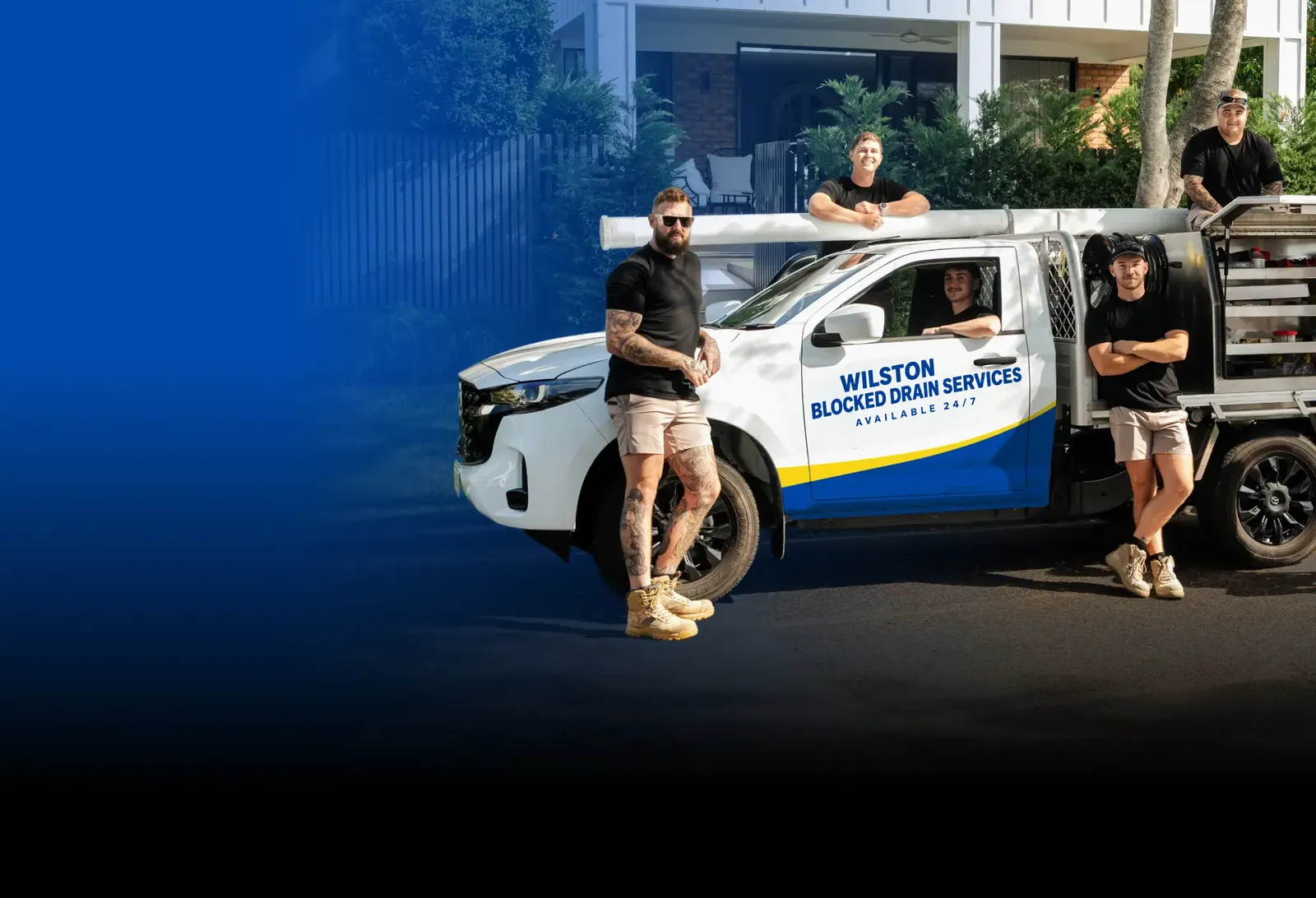 Wilston Blocked Drain Services team with the ute